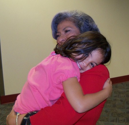 Sophia hugs Abuela